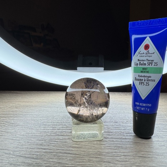 Elegant Smokey Quartz Sphere with Intricate Patterns - Picture 3 of 3